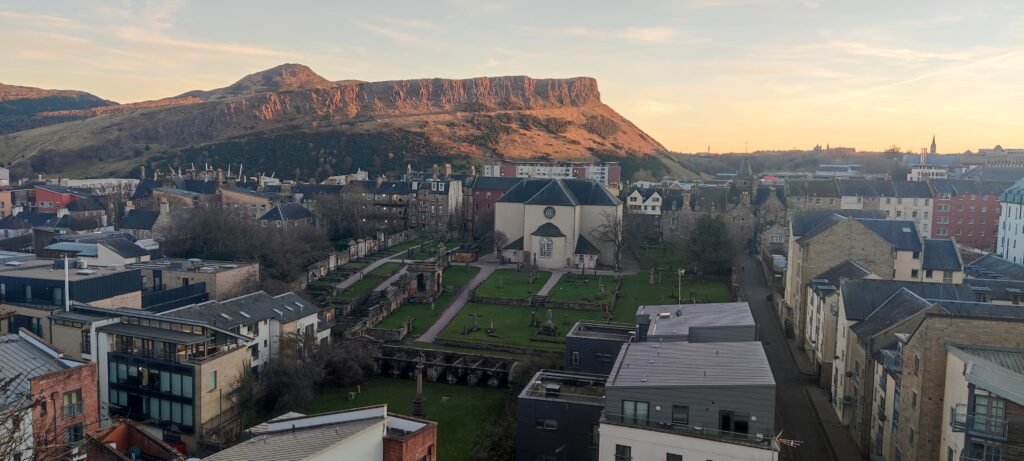Scenic view of Arthur’s Seat from Regent Road in Edinburgh.